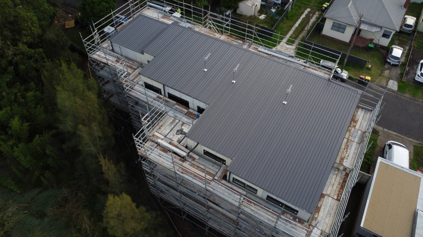 Drone view along the scaffold and new roof edge, Jesmond