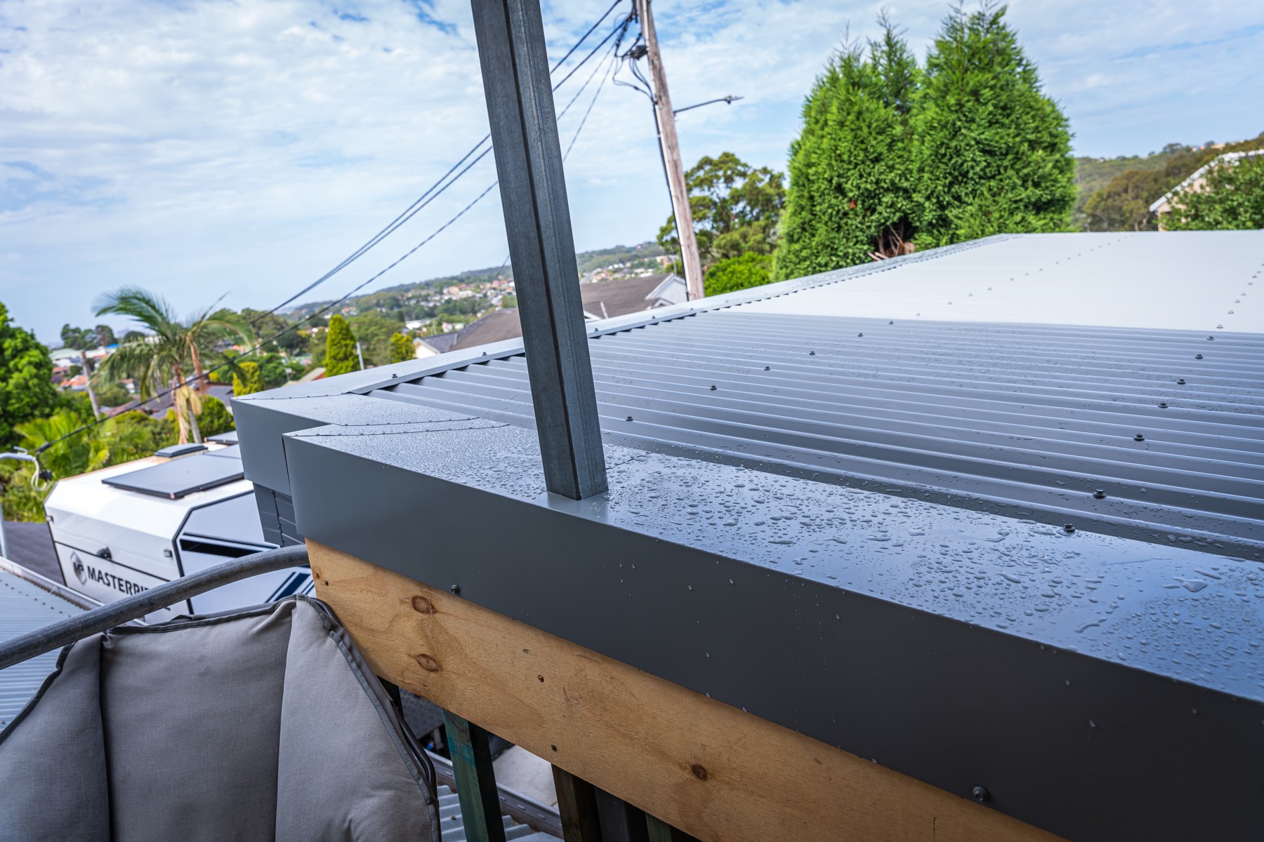 New fascia and gutter edge detail on a metal roof